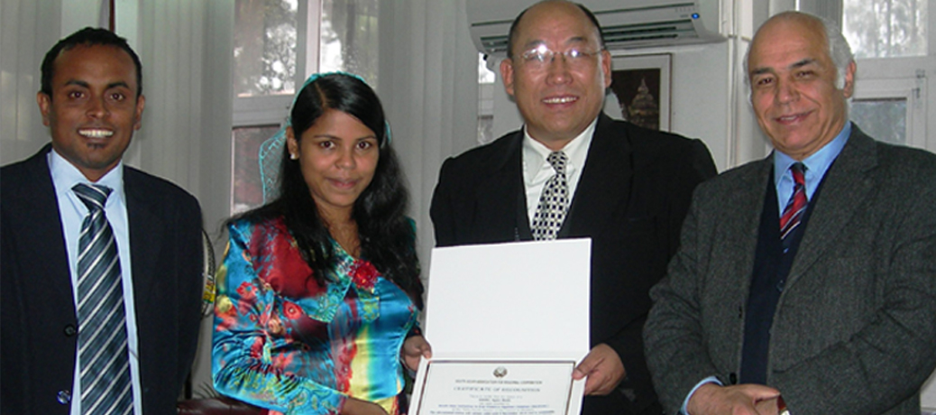 Certificate being awarded by SAARC Secretary General, H.E. Uz. Fathimath Dhiyana Saeed to Dr. Rinchen Chopel.